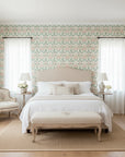 Heirloom Hush soft sage damask wallpaper adding character to a cozy bedroom