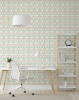 Heirloom Hush soft sage damask wallpaper as a feature wall in a bright home office