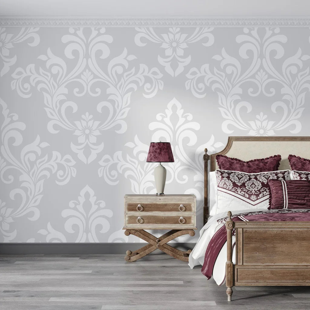 Silver and white damask Heirloom Rose Medley wallpaper in elegant bedroom with plum accents