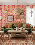 Hibiscus Carnival vibrant pink tropical wallpaper in a warm and inviting living room