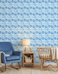 Hive Blue watercolor geometric peel and stick wallpaper as a feature wall in a bright home office