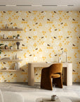 Honey Blooms yellow bumblebee and honeycomb wallpaper as a feature wall in a bright home office