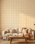 Honey Ikat golden geometric peel and stick wallpaper in a warm and inviting living room