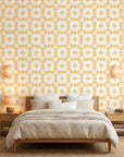 Honey Ikat golden geometric peel and stick wallpaper adding character to a cozy bedroom