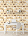 Honey Smiles yellow striped cute bear face wallpaper as a feature wall in a bright home office