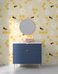 A vibrant yellow pattern of buzzing bees and nectar-rich flowers on a honeycomb backdrop for walls - Honey Blooms