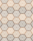 Honeycomb Drift, a peel and stick wallpaper featuring a geometric hexagon pattern in beige and brown tones