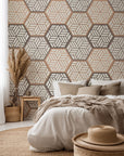 Beige and brown peel and stick wallpaper featuring a geometric hexagon tile design