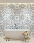 Honeyed Petal Mural dusty blue damask wallpaper creating ambiance in a serene bathroom