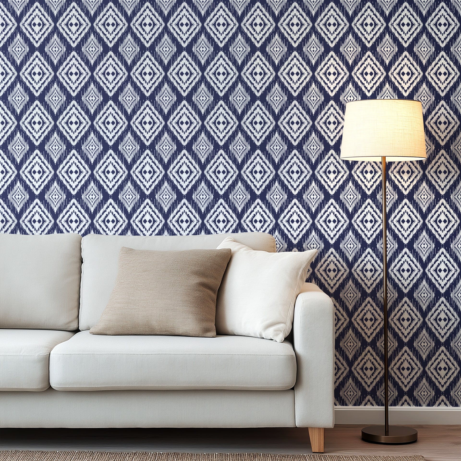 Navy blue ikat style wallpaper with repeating white diamond motifs and textured hand painted edges.