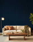 Indigo Undertow deep navy blue swirling abstract wallpaper creating ambiance in a serene bathroom