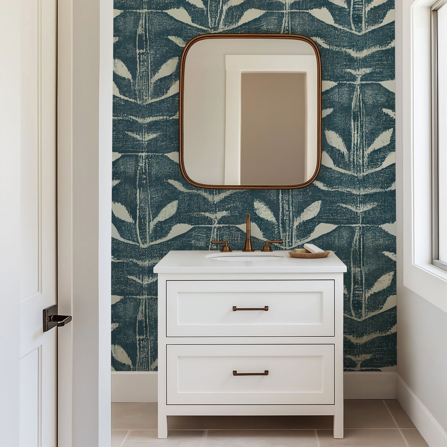 Teal blue hand painted wallpaper with repeating abstract leaf shapes and layered textured brush strokes.