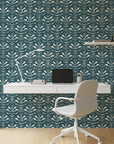 Indigo Vine blue foliage wallpaper as a feature wall in a bright home office