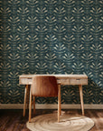 Teal blue hand painted wallpaper with repeating abstract leaf shapes and layered textured brush strokes.