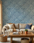 Indigo Weave textured wallpaper with geometric crosshatch pattern on modern living room accent wall