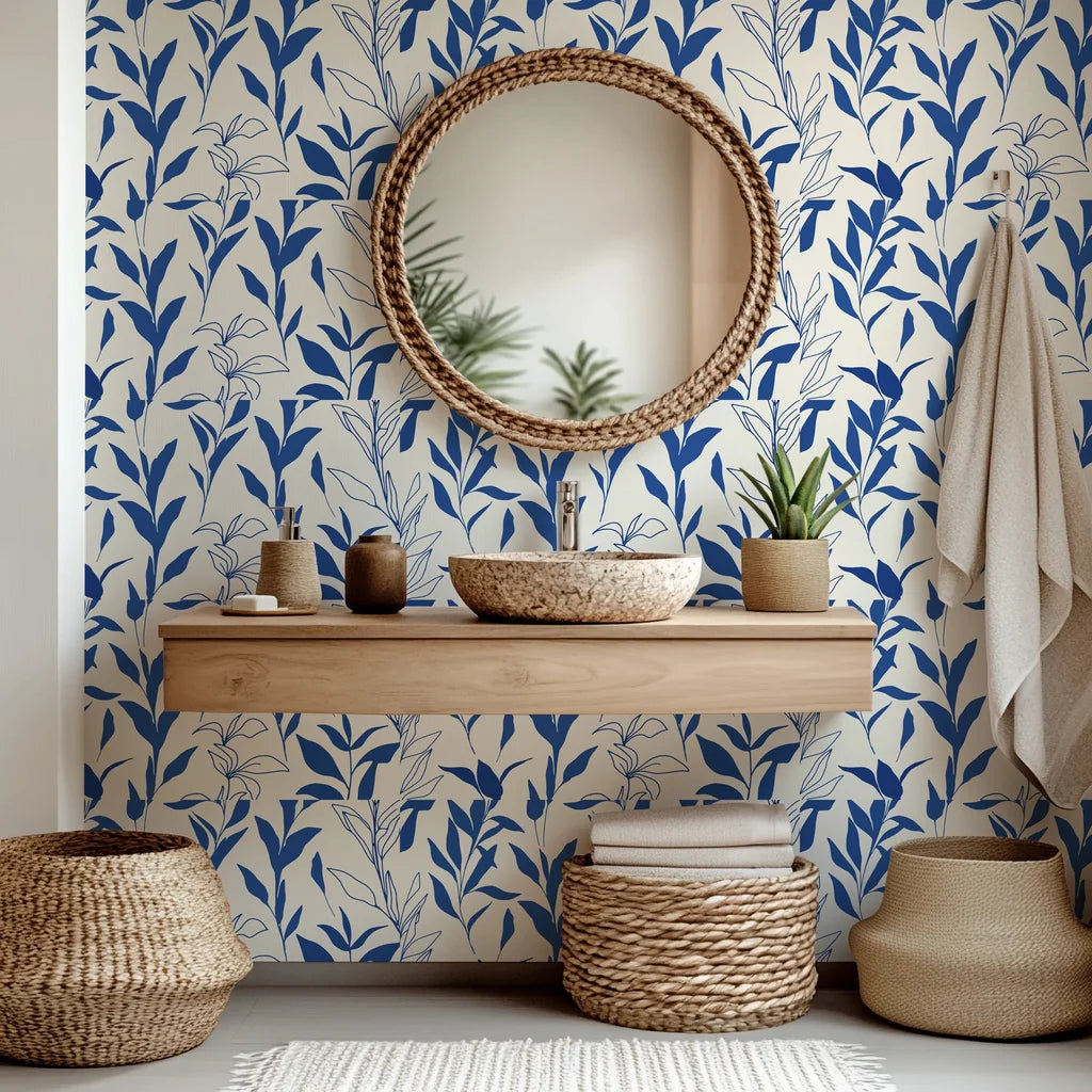 Simple blue leaf illustrations on cream-toned peel and stick wallpaper