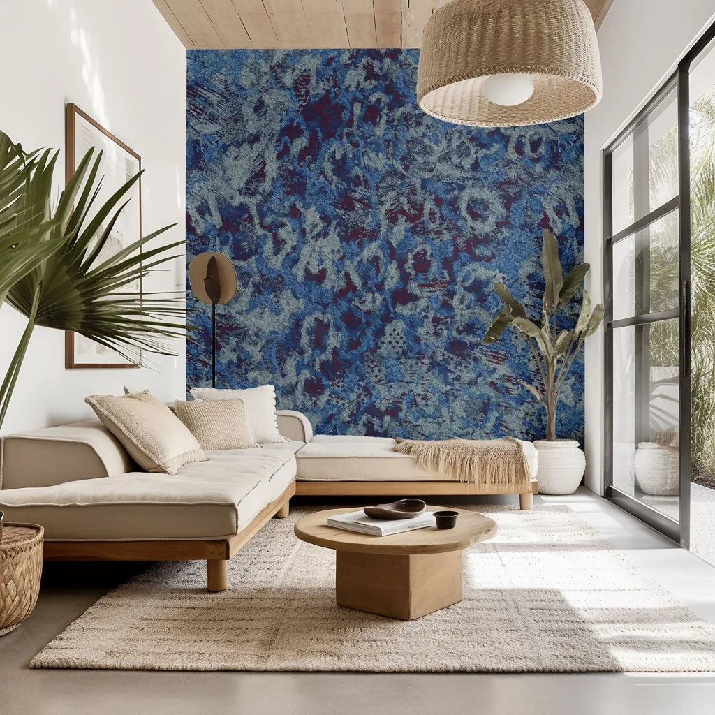 Peel and stick wallpaper featuring a textured, abstract grunge design in blue and purple hues, named Indigo Static