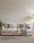 Ink Blossom serene blue floral sprig wallpaper in a warm and inviting living room