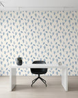 Ink Blossom serene blue floral sprig wallpaper as a feature wall in a bright home office