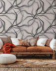 A wallpaper design titled 'Ink Rivers' featuring black and beige abstract, flowing lines of ink.
