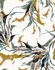 Painterly, self-adhesive wall covering featuring an abstract design of white and green feathers, product Ink Whispers