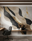 Inked Ribbons bold charcoal and gold abstract as a feature wall in a bright home office