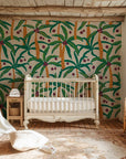 Tropical botanical wall covering featuring muted beige palm fronds on a flat cream background. - Island Rhythms