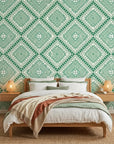 Jade Current green abstract peel and stick wallpaper adding character to a cozy bedroom