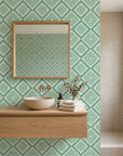 Jade Current green abstract peel and stick wallpaper creating ambiance in a serene bathroom