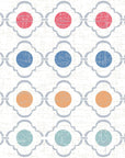 Moroccan quatrefoil Jade Trellis wallpaper with coral, blue, peach, and mint circles on distressed white background