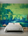 Jade & Rain bold green abstract painterly wallpaper in a warm and inviting living room