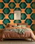 Jeweled Depths vibrant green and orange geometric wallpaper in a warm and inviting living room