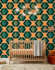 Jeweled Depths vibrant green and orange geometric wallpaper as a feature wall in a bright home office