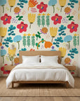 Joy Bloom white colorful scandi floral wallpaper adding character to a cozy bedroom
