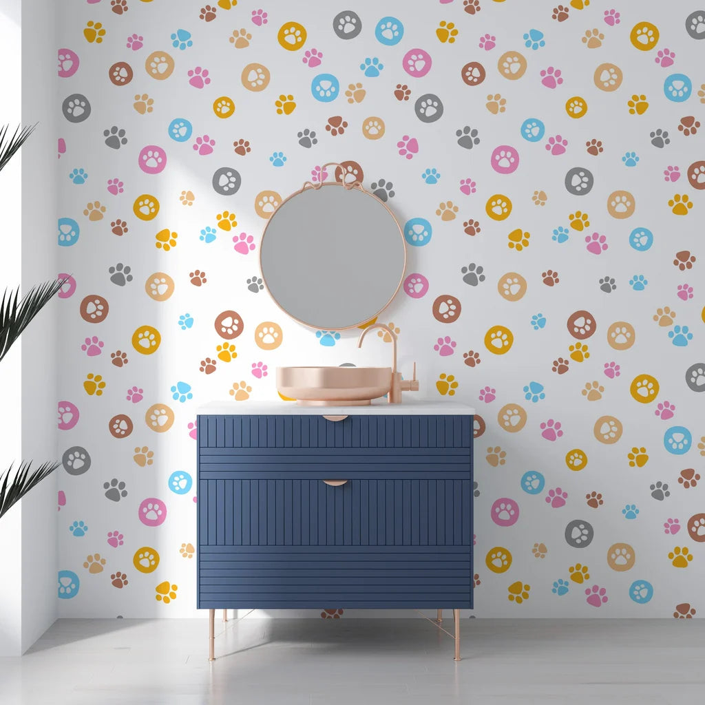 A playful array of rainbow-colored paw prints on a peel-and-stick decorative wall mural - Joyful Jaunts