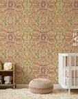Jungle Echo green geometric peel and stick wallpaper bringing warmth to a peaceful nursery