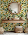 Self-adhesive wallpaper featuring an abstract design of yellow and green exotic foliage