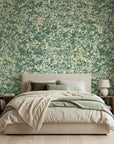 Jungle Hour green abstract peel and stick wallpaper adding character to a cozy bedroom