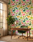 Jurassic Bloom green botanical dinosaur wallpaper adding character to a cozy bedroom