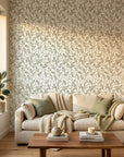 Khaki Leaf botanical wallpaper with sage green foliage pattern on living room accent wall