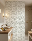 Taupe and cream Khaki Leaf peel and stick wallpaper in modern spa bathroom with natural lighting