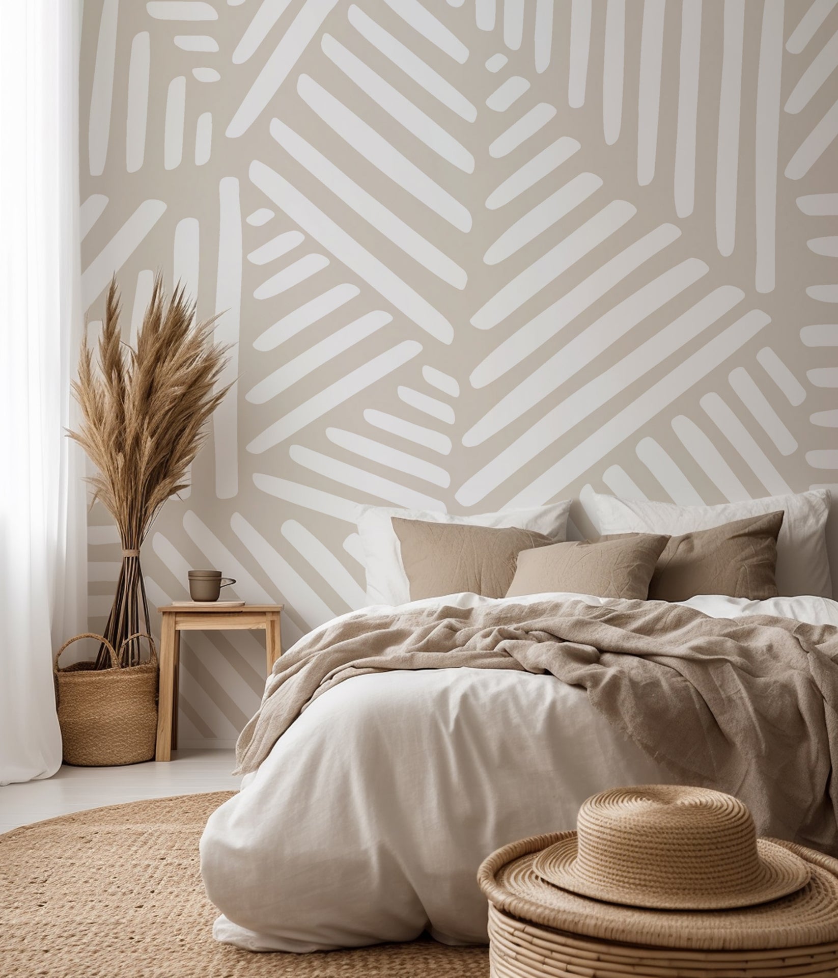 Neutral beige wallpaper with repeating hand drawn geometric blocks made of white linear brush strokes.