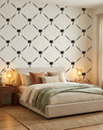 Latticed Isle tropical trellis wallpaper adding character to a cozy bedroom