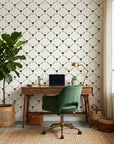 Latticed Isle tropical trellis wallpaper as a feature wall in a bright home office