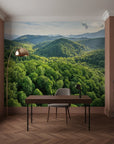 Stratified green landscape creating sense of depth removable wall mural
