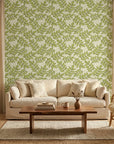 Lime Canopy green botanical peel and stick wallpaper in a warm and inviting living room