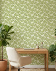 Lime Canopy green botanical peel and stick wallpaper as a feature wall in a bright home office