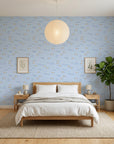 Little Minnows blue nursery fish wallpaper adding character to a cozy bedroom