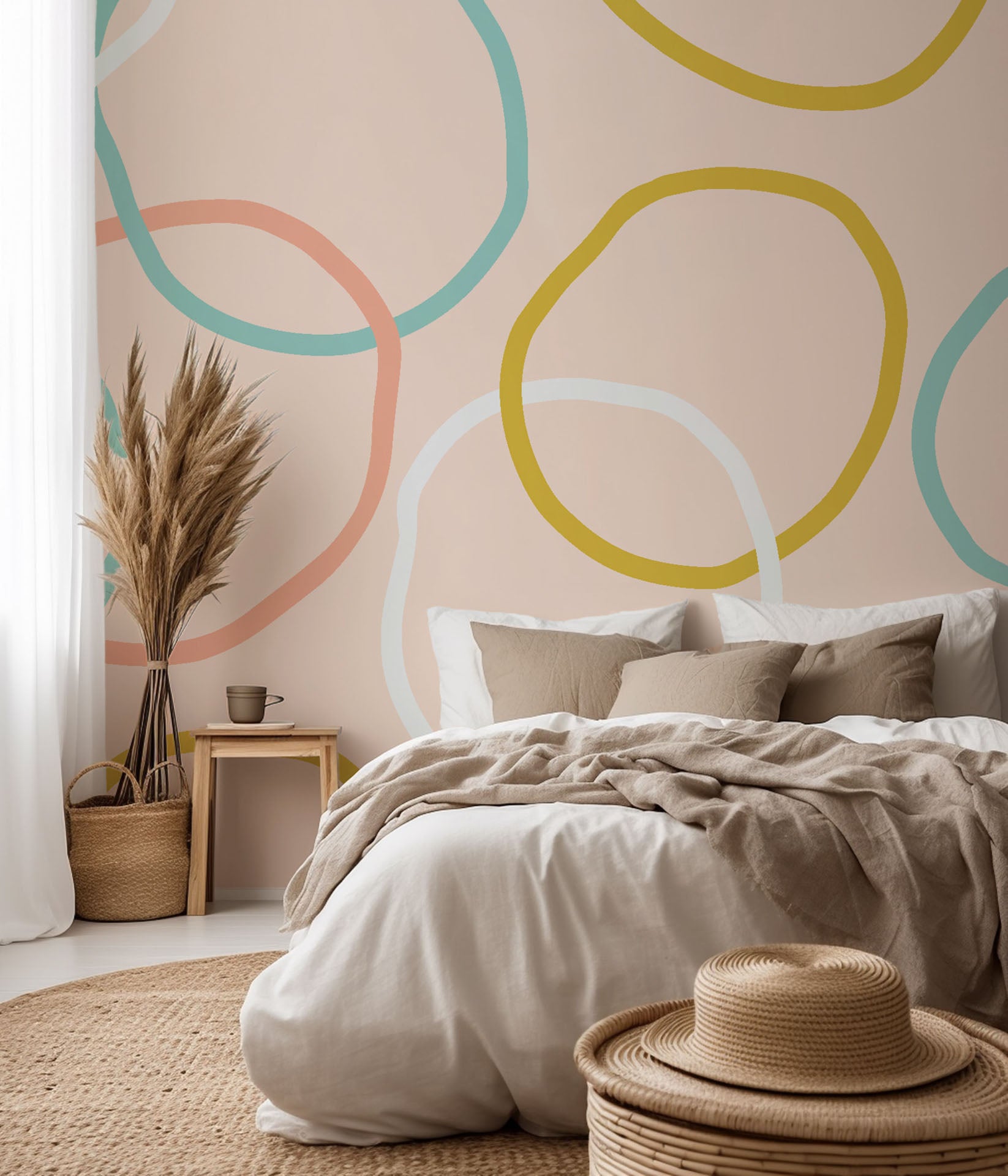 Soft yellow and pastel pink self-adhesive wallcovering featuring an abstract looping pattern, called Loop Dreams