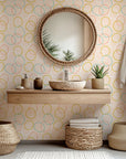 Soft-hued pink and yellow abstract loop design on self-adhesive, removable wallpaper (Loop Dreams)
